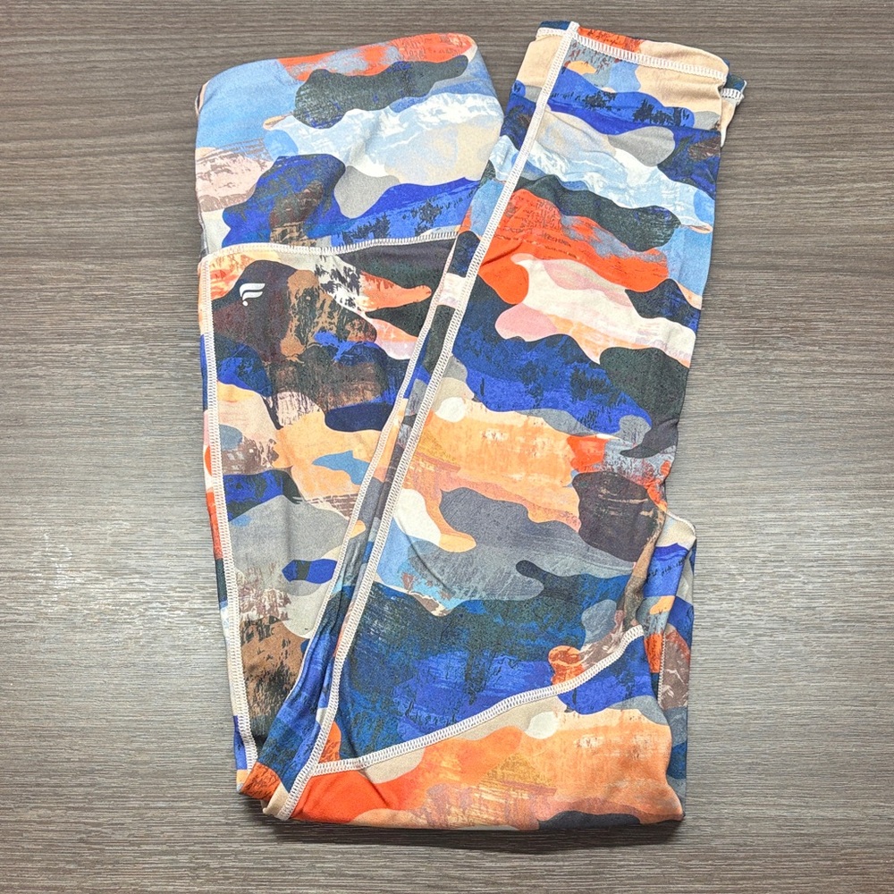 Fabletics Anywhere High Waisted 7/8 Legging, Zenith Pattern Orange Blue. Small